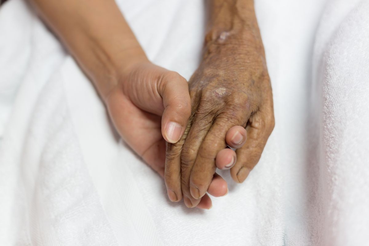 Young hand holding hands patient concept of patient encouragement